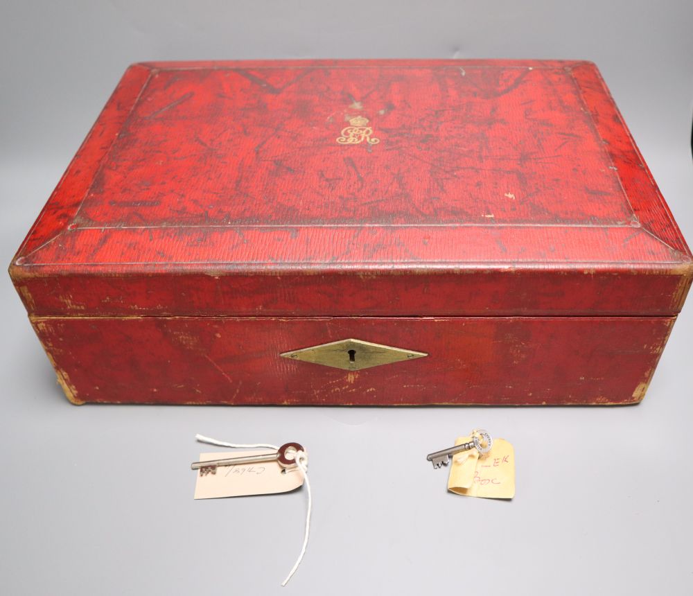 A red leather despatch box bearing King George V royal cypher, locked with key inside, width 41cm